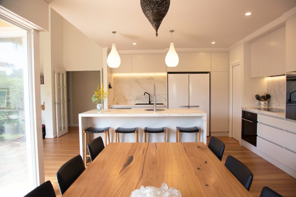 brown wooden table with chairs